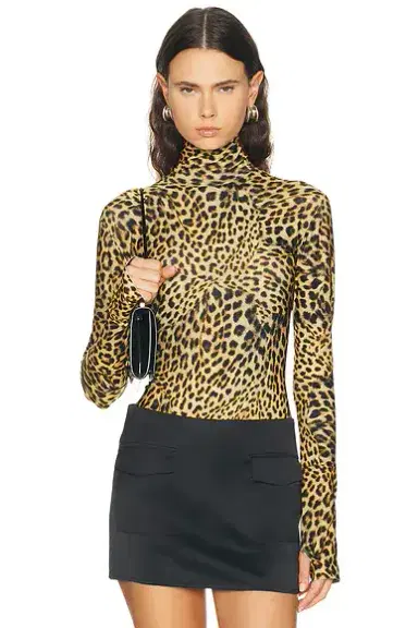 Norma Kamali Slim Fit Long Sleeve Turtle Top | Thumbnail 1 Norma Kamali Slim Fit Long Sleeve Turtle Top | Thumbnail 1