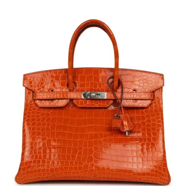 HERMÈS Pre-owned Hermes Birkin 35 Orange Shiny Porosus Crocodile Palladium Hardware | Thumbnail 1 HERMÈS Pre-owned Hermes Birkin 35 Orange Shiny Porosus Crocodile Palladium Hardware | Thumbnail 1