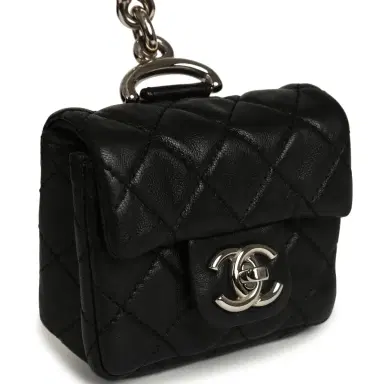 Chanel Pre-owned Chanel Medium "Tibet" Flap Bag & Mini Flap Bag Charm Black Lambskin, Goat Fur Silver Hardware | Thumbnail 7 Chanel Pre-owned Chanel Medium "Tibet" Flap Bag & Mini Flap Bag Charm Black Lambskin, Goat Fur Silver Hardware | Thumbnail 7