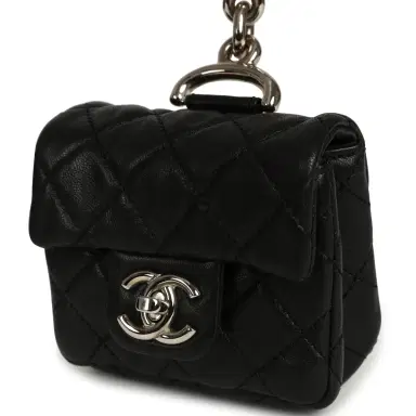 Chanel Pre-owned Chanel Medium "Tibet" Flap Bag & Mini Flap Bag Charm Black Lambskin, Goat Fur Silver Hardware | Thumbnail 9 Chanel Pre-owned Chanel Medium "Tibet" Flap Bag & Mini Flap Bag Charm Black Lambskin, Goat Fur Silver Hardware | Thumbnail 9