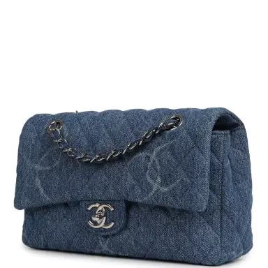 Chanel Pre-owned Chanel Medium Classic "CC Printed" Flap Bag Blue Denim Silver Hardware | Thumbnail 5 Chanel Pre-owned Chanel Medium Classic "CC Printed" Flap Bag Blue Denim Silver Hardware | Thumbnail 5