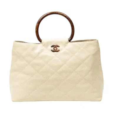 Chanel Chanel CC Ivory/Brown Calf Leather Wood Handle Tote by The Solist | Thumbnail 1 Chanel Chanel CC Ivory/Brown Calf Leather Wood Handle Tote by The Solist | Thumbnail 1