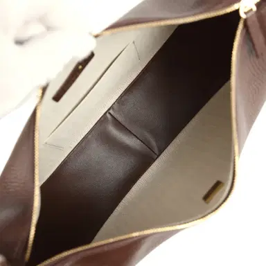 Chanel Chanel Round Top Handle Hobo Bag Dark Brown Grained Calfskin Gold Hardware | Thumbnail 8 Chanel Chanel Round Top Handle Hobo Bag Dark Brown Grained Calfskin Gold Hardware | Thumbnail 8