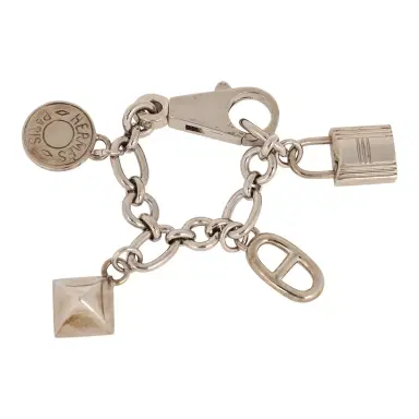 HERMÈS Pre-owned Hermes Amulette Olga Cadena Bag Charm Palladium Hardware | Thumbnail 2 HERMÈS Pre-owned Hermes Amulette Olga Cadena Bag Charm Palladium Hardware | Thumbnail 2