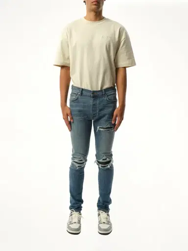 AMIRI Mx1 Distressed Jeans in Dark Indigo Blue | Thumbnail 4 AMIRI Mx1 Distressed Jeans in Dark Indigo Blue | Thumbnail 4