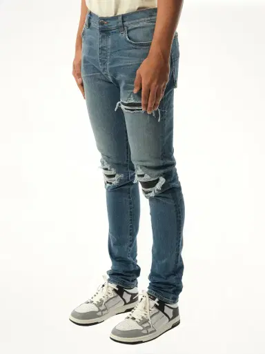AMIRI Mx1 Distressed Jeans in Dark Indigo Blue | Thumbnail 5 AMIRI Mx1 Distressed Jeans in Dark Indigo Blue | Thumbnail 5