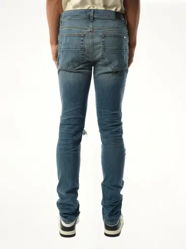 AMIRI Mx1 Distressed Jeans in Dark Indigo Blue | Thumbnail 6 AMIRI Mx1 Distressed Jeans in Dark Indigo Blue | Thumbnail 6