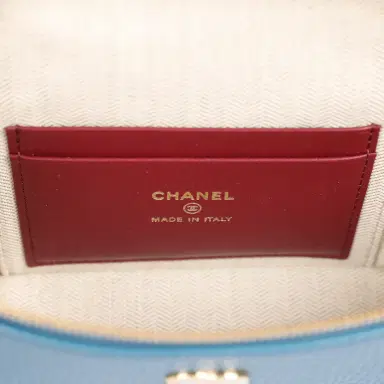 Chanel Chanel "Supple" Top Handle Long Vanity Case with Chain Dark Blue Grained Calfskin Gold Hardware | Thumbnail 8 Chanel Chanel "Supple" Top Handle Long Vanity Case with Chain Dark Blue Grained Calfskin Gold Hardware | Thumbnail 8