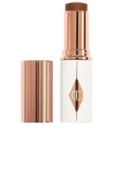Charlotte Tilbury Unreal Skin Sheer Glow Tint Hydrating Foundation Stick | Thumbnail 1 Charlotte Tilbury Unreal Skin Sheer Glow Tint Hydrating Foundation Stick | Thumbnail 1