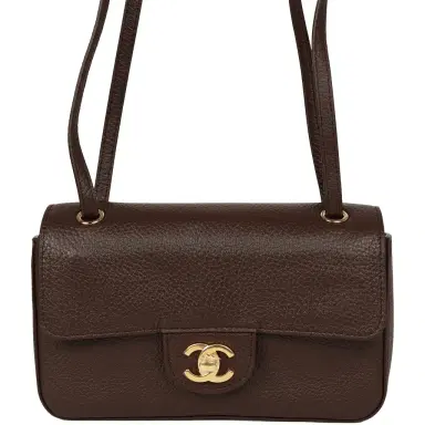Chanel Chanel Mini "Souplissimo" Flap Bag Dark Brown Grained Calfskin Gold Hardware | Thumbnail 1 Chanel Chanel Mini "Souplissimo" Flap Bag Dark Brown Grained Calfskin Gold Hardware | Thumbnail 1