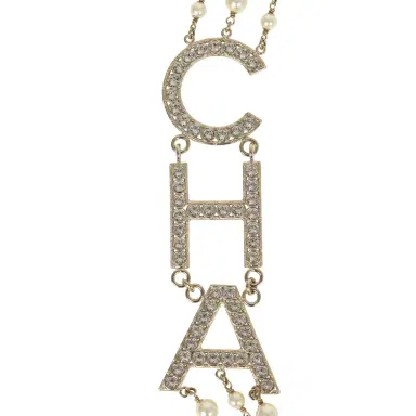 Chanel Chanel Long Crystal CHA-NEL Multi-Strand CC Pearl Necklace Ivory Pearls, Light Gold Tone Hardware | Thumbnail 3 Chanel Chanel Long Crystal CHA-NEL Multi-Strand CC Pearl Necklace Ivory Pearls, Light Gold Tone Hardware | Thumbnail 3