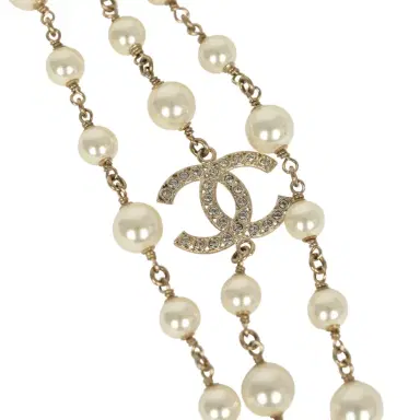 Chanel Chanel Long Crystal CHA-NEL Multi-Strand CC Pearl Necklace Ivory Pearls, Light Gold Tone Hardware | Thumbnail 6 Chanel Chanel Long Crystal CHA-NEL Multi-Strand CC Pearl Necklace Ivory Pearls, Light Gold Tone Hardware | Thumbnail 6