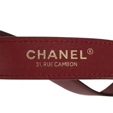 Chanel Chanel Small "CC Loop" Drawstring Bucket Bag with Leather Strap Dark Burgundy Suede, Calfskin Gold Hardware | Thumbnail 9 Chanel Chanel Small "CC Loop" Drawstring Bucket Bag with Leather Strap Dark Burgundy Suede, Calfskin Gold Hardware | Thumbnail 9
