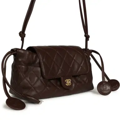Chanel Chanel Drawstring Flap Bag with Leather Strap Dark Brown Lambskin Gold Hardware | Thumbnail 2 Chanel Chanel Drawstring Flap Bag with Leather Strap Dark Brown Lambskin Gold Hardware | Thumbnail 2